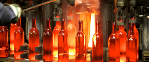 New glass bottles leaving the furnace
